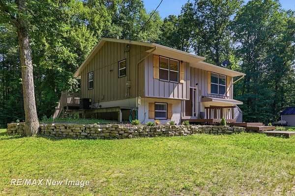 1.82 Acres of Land with Home for Sale in Shepherd, Michigan