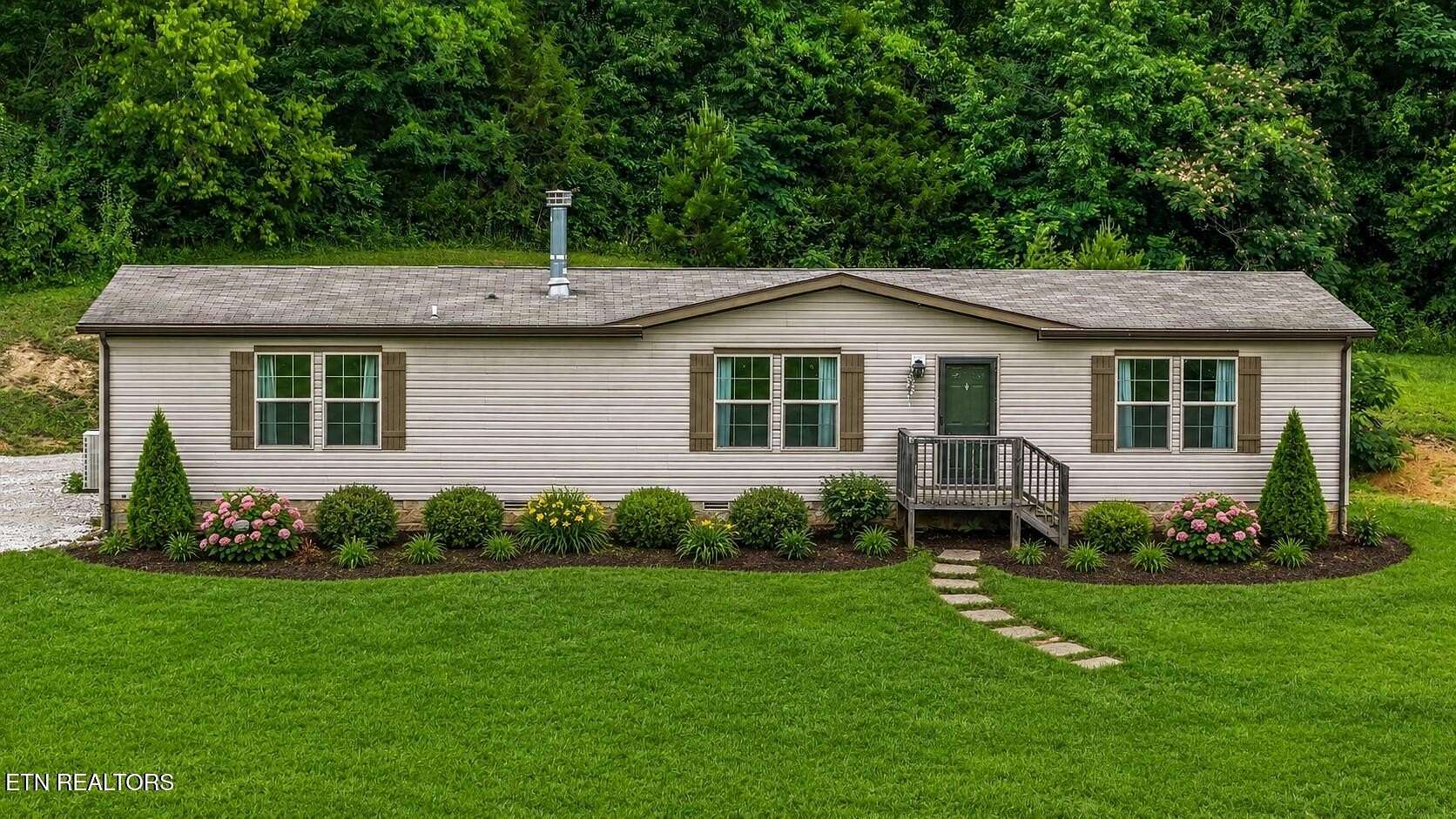 3.23 Acres of Land with Home for Sale in Friendsville, Tennessee