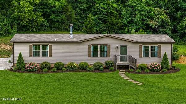 3.23 Acres of Land with Home for Sale in Friendsville, Tennessee