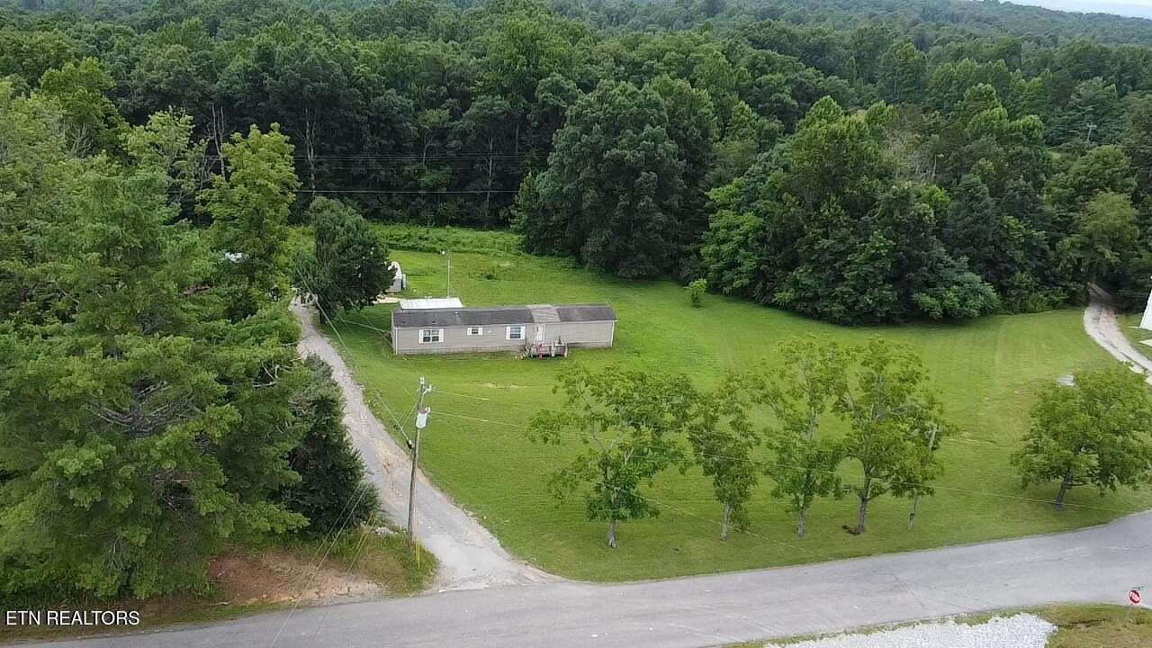 3.3 Acres of Land with Home for Sale in Lancing, Tennessee
