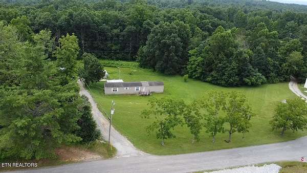 3.3 Acres of Land with Home for Sale in Lancing, Tennessee