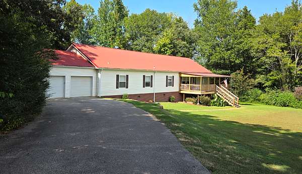 34.4 Acres of Land with Home for Sale in Cedar Grove, Tennessee