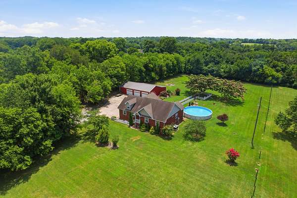 5 Acres of Land with Home for Sale in Castalian Springs, Tennessee