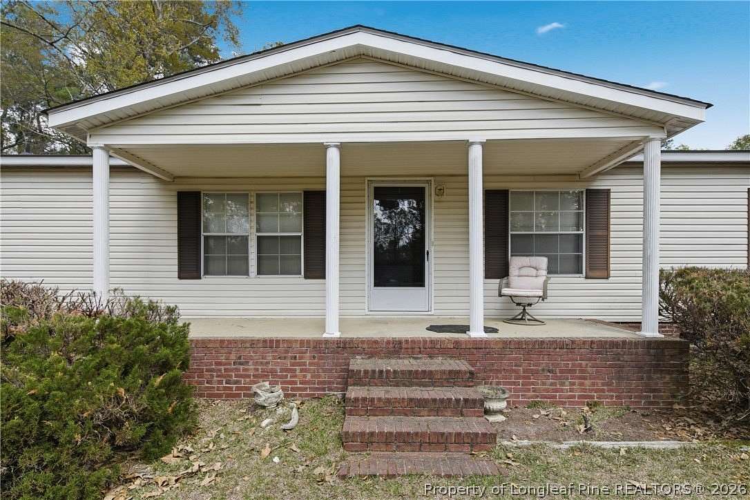 3 Acres of Land with Home for Sale in Hope Mills, North Carolina