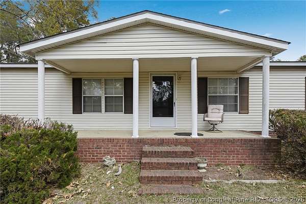 3 Acres of Land with Home for Sale in Hope Mills, North Carolina