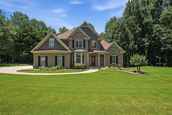 2 Acres of Land with Home for Sale in Flowery Branch, Georgia