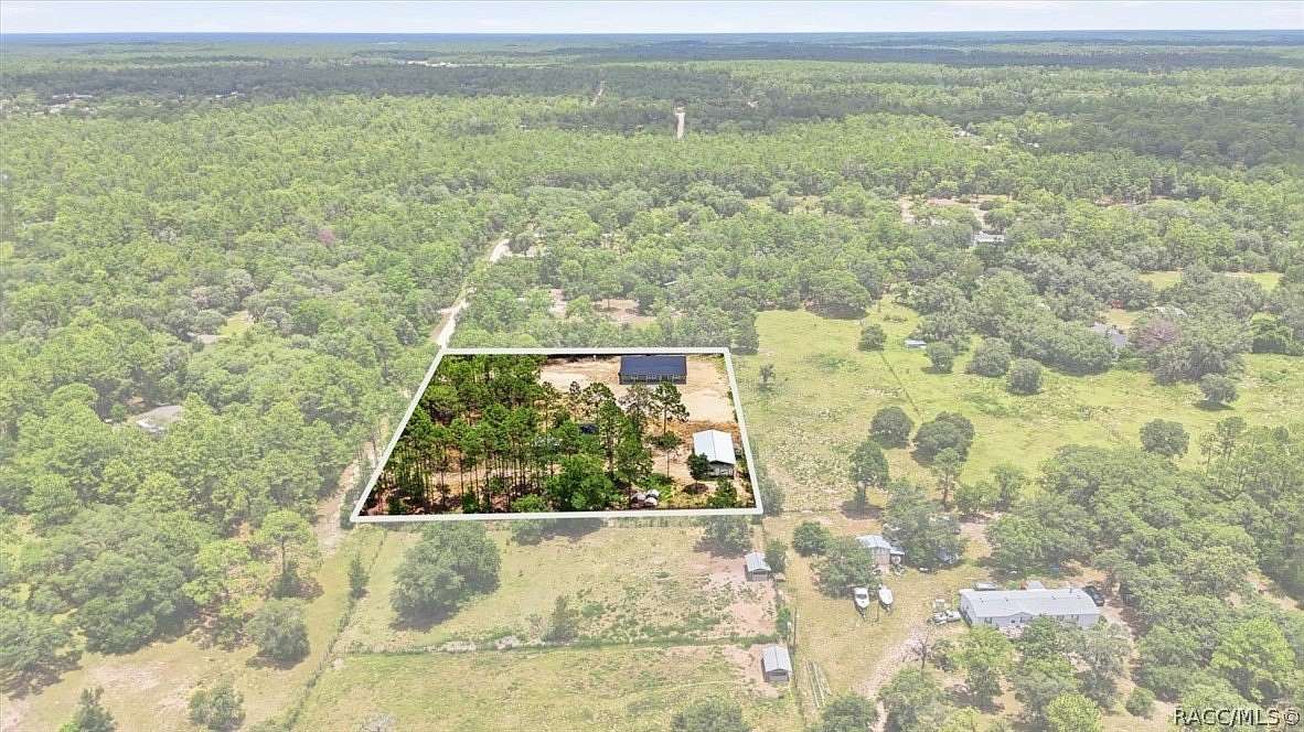 2.64 Acres of Land with Home for Sale in Dunnellon, Florida