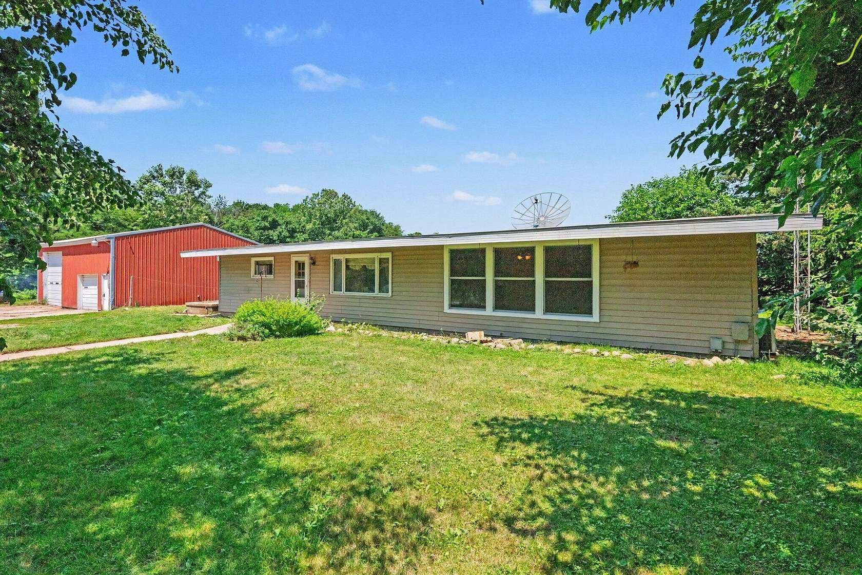 2.28 Acres of Land with Home for Sale in Eau Claire, Michigan