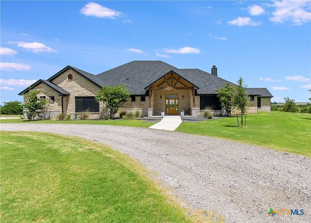 30 Acres of Land with Home for Auction in Rogers, Texas