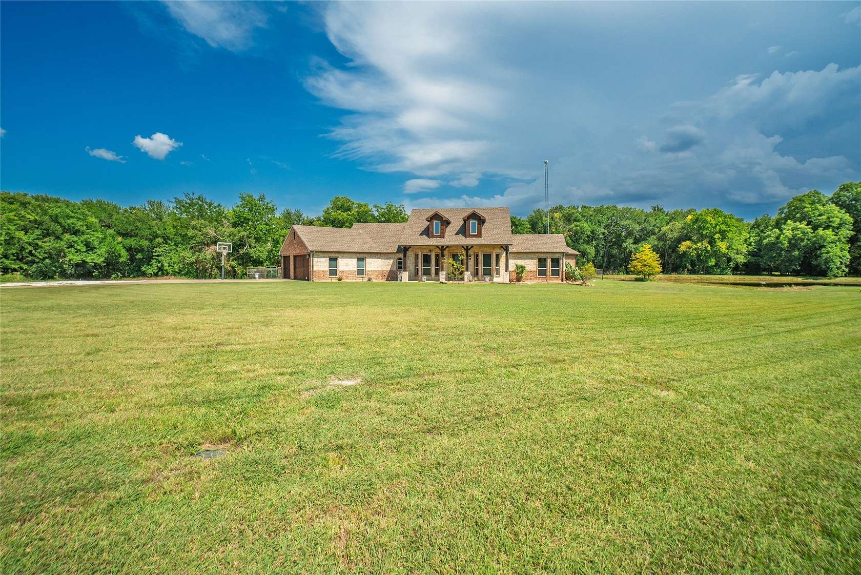 7.75 Acres of Land with Home for Sale in Bonham, Texas