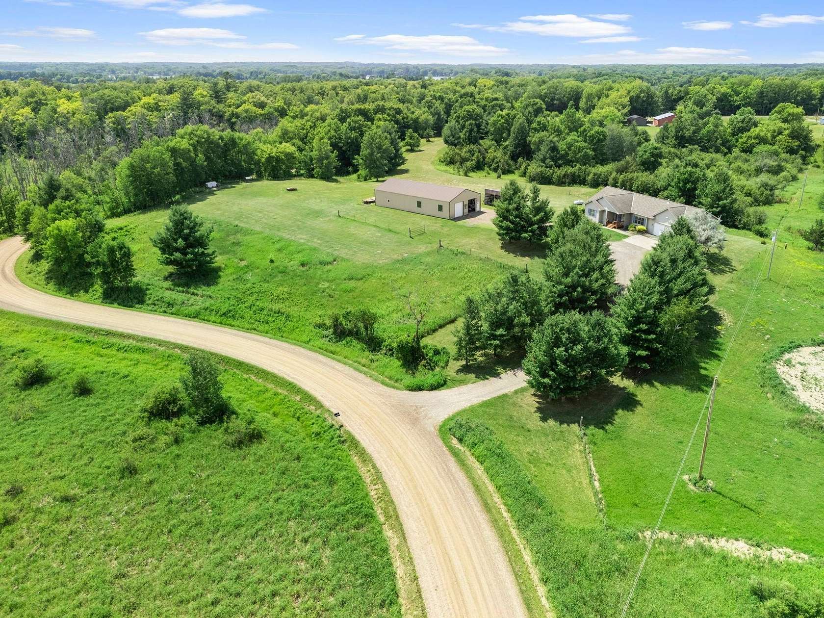 25 Acres of Land with Home for Sale in Stanchfield, Minnesota