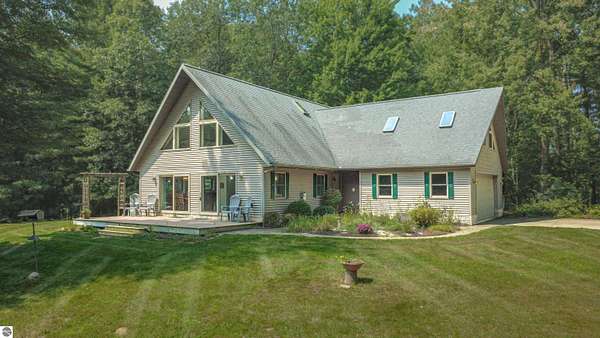 12.3 Acres of Land with Home for Sale in Edmore, Michigan