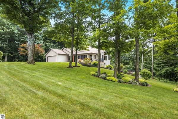 5 Acres of Land with Home for Sale in Beulah, Michigan