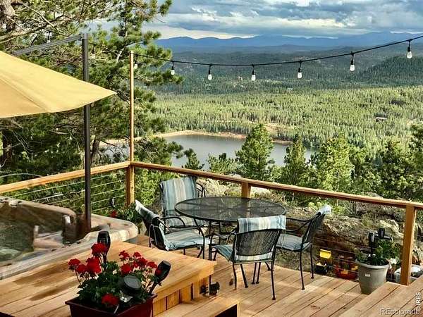 4.37 Acres of Land with Home for Sale in Red Feather Lakes, Colorado