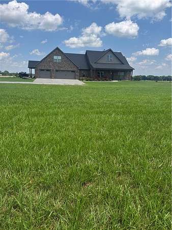 59 Acres of Agricultural Land with Home for Sale in Siloam Springs, Arkansas