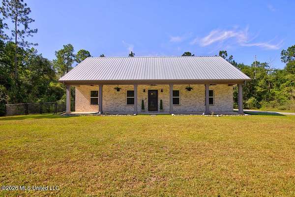 3 Acres of Land with Home for Sale in Kiln, Mississippi