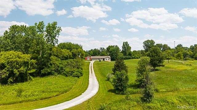 4.3 Acres of Land with Home for Sale in Handy Township, Michigan