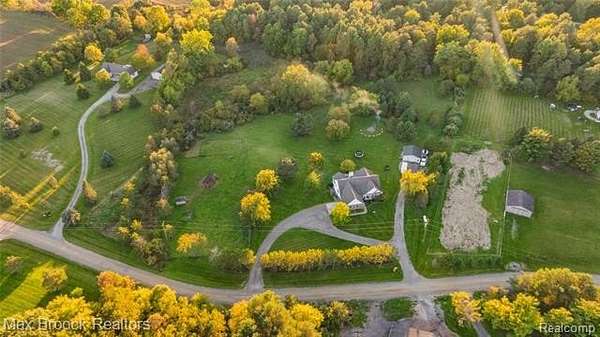 5.6 Acres of Land with Home for Sale in Hadley Township, Michigan