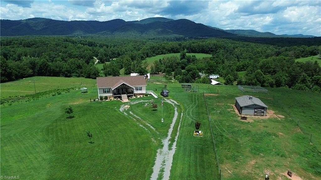 8.4 Acres of Land with Home for Sale in Traphill, North Carolina