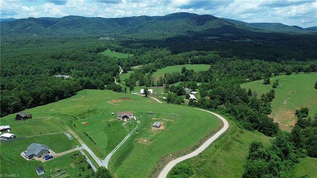 8.4 Acres of Land with Home for Sale in Traphill, North Carolina