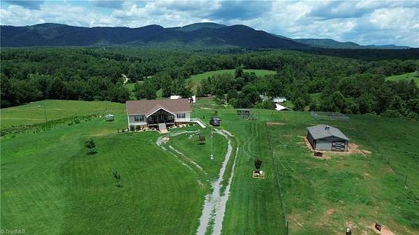 8.4 Acres of Land with Home for Sale in Traphill, North Carolina