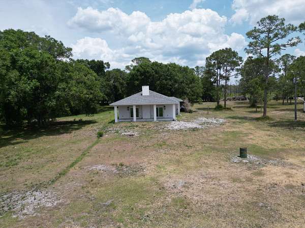 4.73 Acres of Land with Home for Sale in Okeechobee, Florida