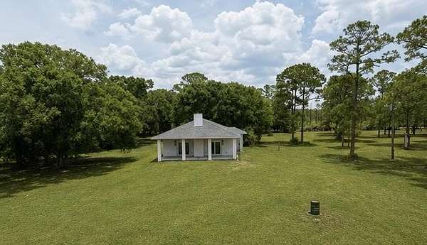 4.73 Acres of Land with Home for Sale in Okeechobee, Florida