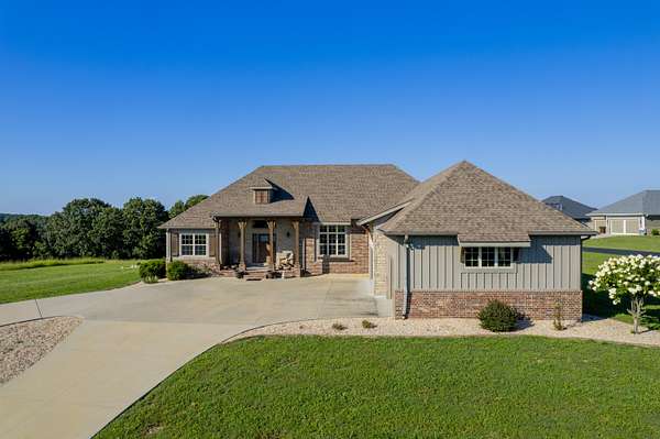 1.7 Acres of Land with Home for Sale in Saddlebrooke, Missouri