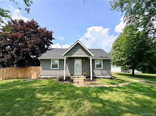 3 Acres of Land with Home for Sale in Monroe Township, Michigan