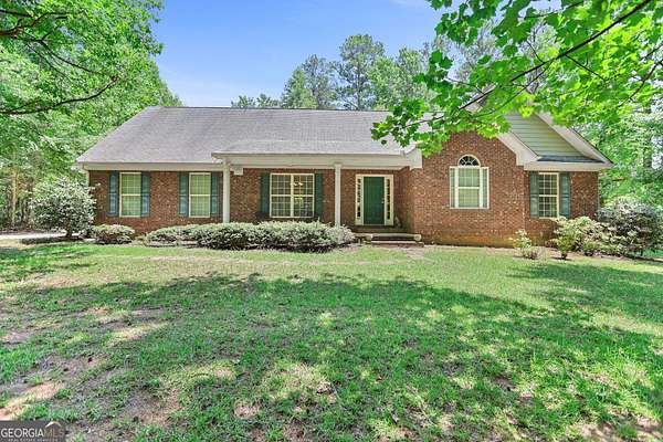 5.7 Acres of Land with Home for Sale in Brooks, Georgia