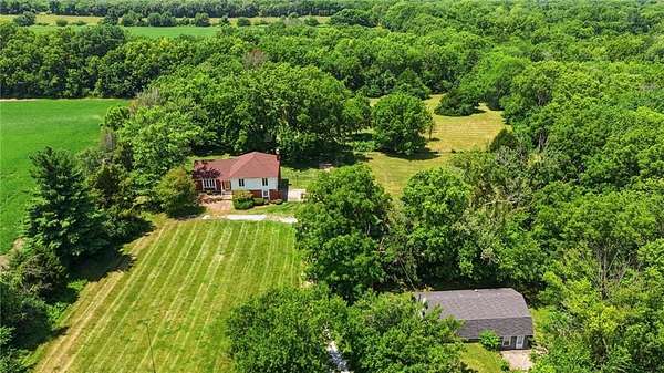 5 Acres of Land with Home for Sale in Belton, Missouri