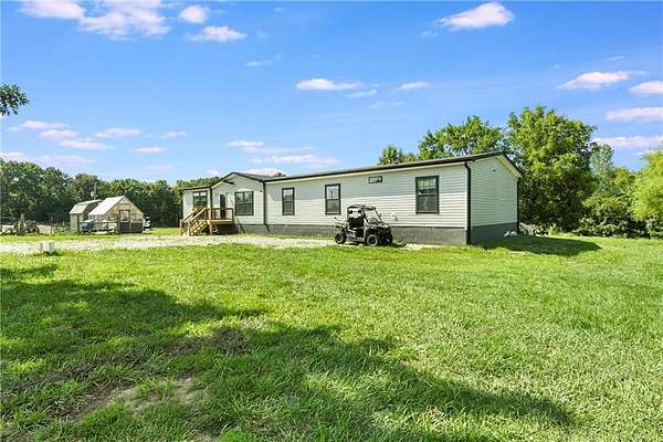 18 Acres of Land with Home for Sale in Urich, Missouri