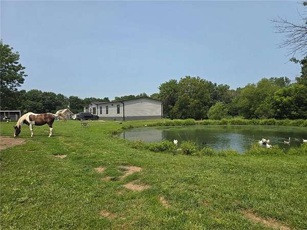 18 Acres of Land with Home for Sale in Urich, Missouri