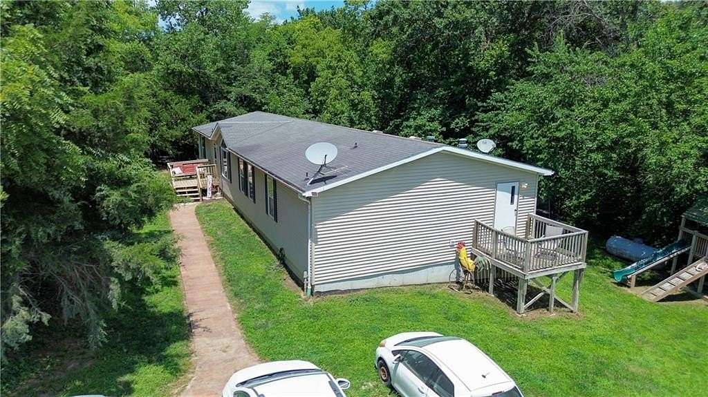 5 Acres of Land with Home for Sale in Sweet Springs, Missouri