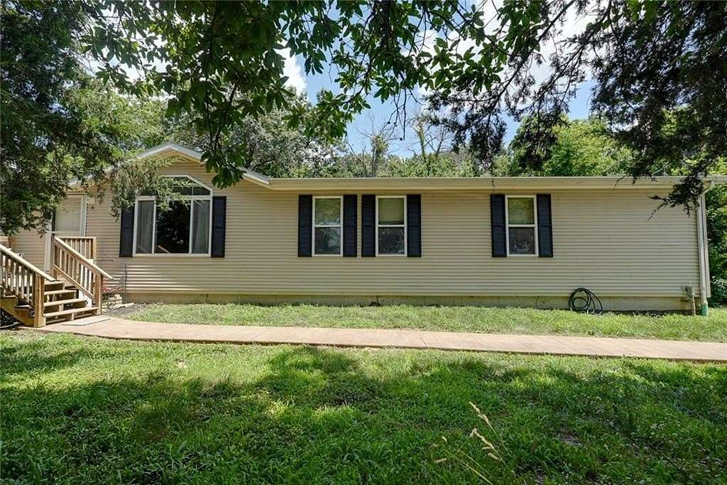 5 Acres of Land with Home for Sale in Sweet Springs, Missouri