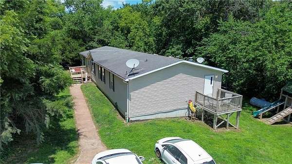 5 Acres of Land with Home for Sale in Sweet Springs, Missouri