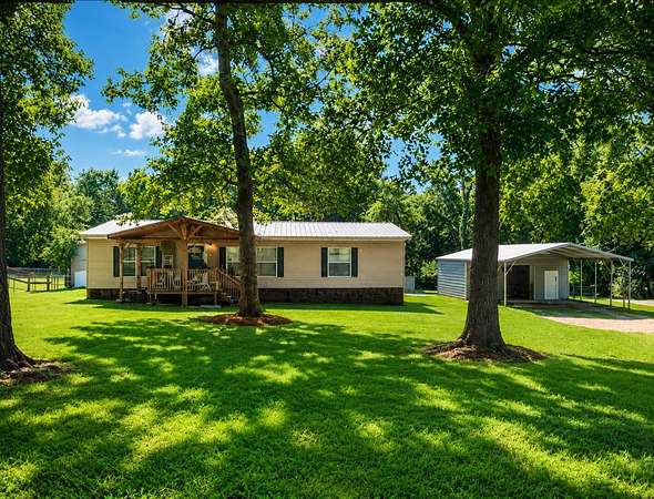 1.62 Acres of Land with Home for Sale in Benton, Louisiana