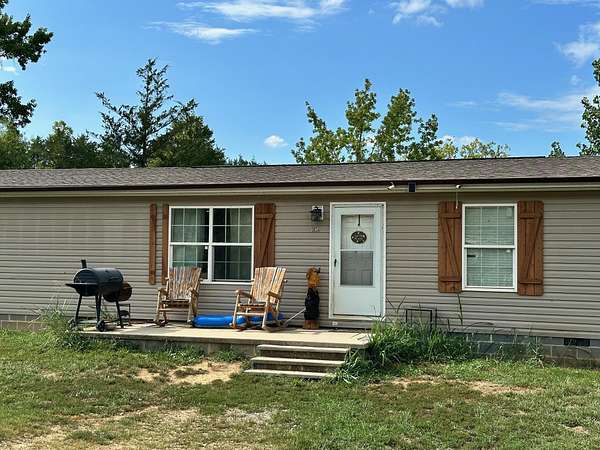 11.4 Acres of Land with Home for Sale in Sevierville, Tennessee