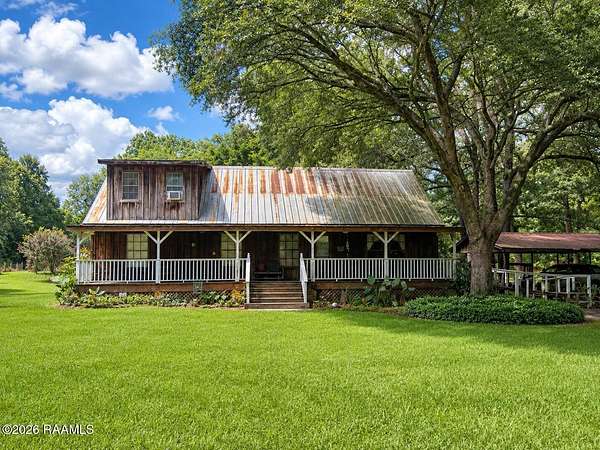 11.7 Acres of Recreational Land with Home for Sale in Ville Platte, Louisiana