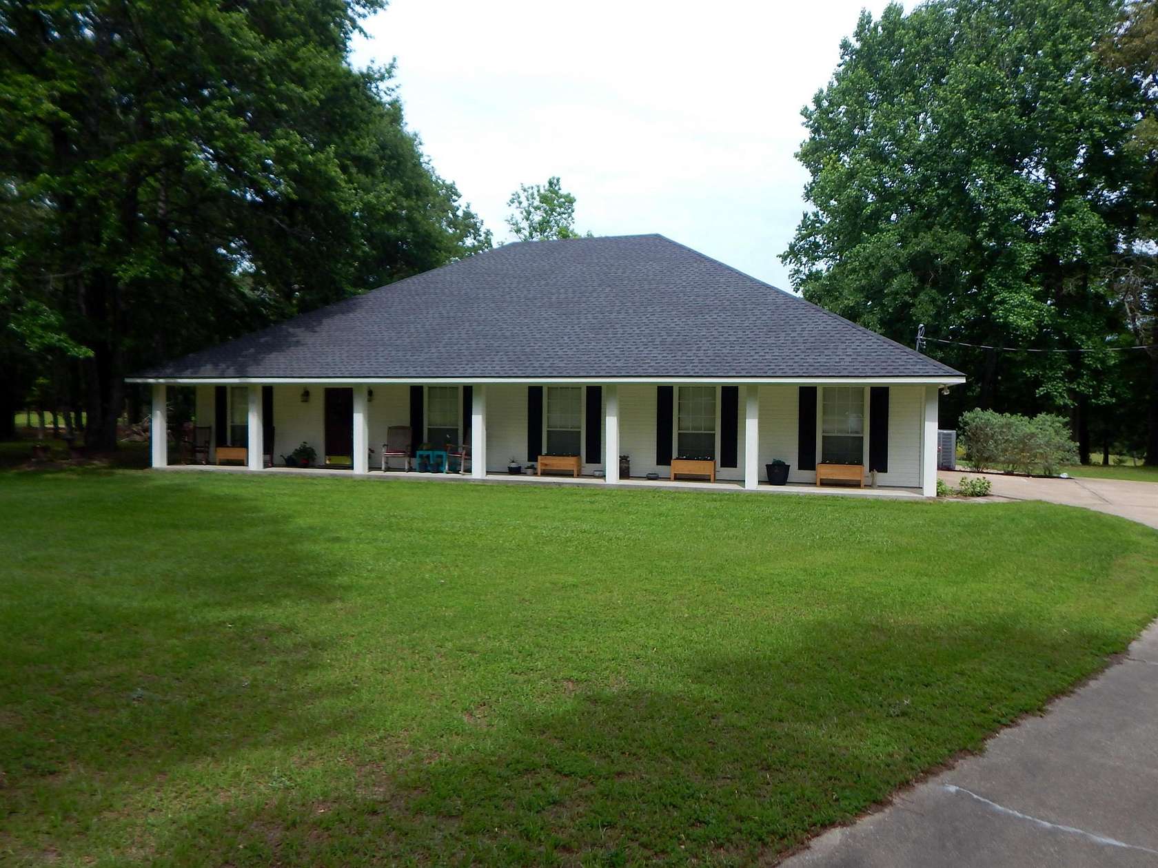 4.86 Acres of Land with Home for Sale in Gilmer, Texas
