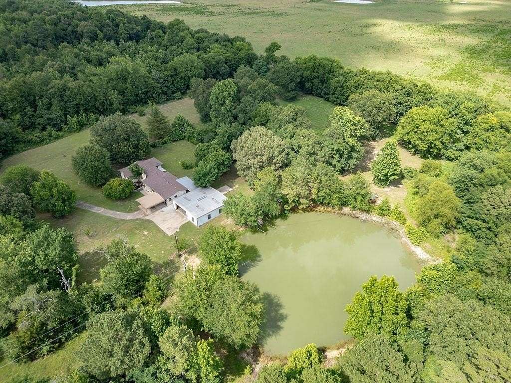 9.15 Acres of Land with Home for Sale in Quitman, Texas