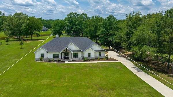 1.55 Acres of Land with Home for Sale in Marshall, Texas