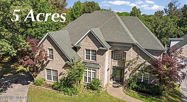 5 Acres of Land with Home for Sale in Coldwater, Mississippi