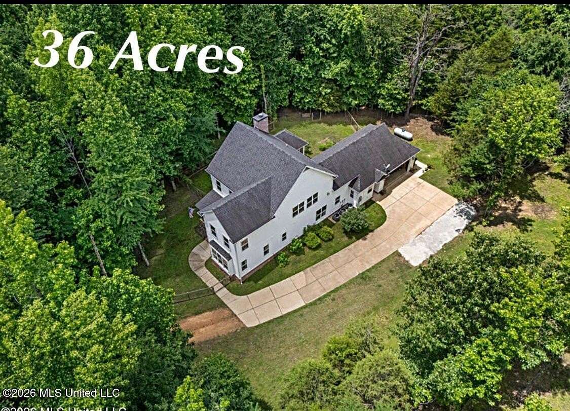 36.1 Acres of Land with Home for Sale in Coldwater, Mississippi