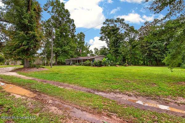 14 Acres of Land with Home for Sale in Kiln, Mississippi