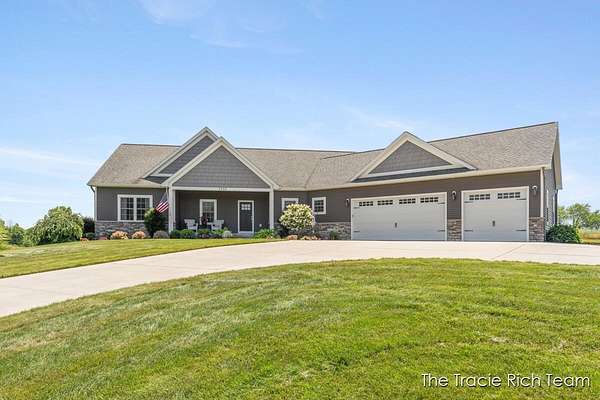 2.89 Acres of Land with Home for Sale in Rockford, Michigan