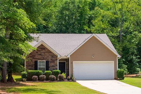 1.56 Acres of Land with Home for Sale in Covington, Georgia