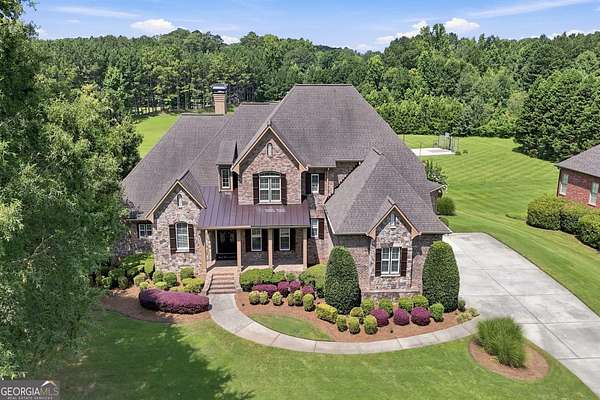 2.55 Acres of Land with Home for Sale in Tyrone, Georgia
