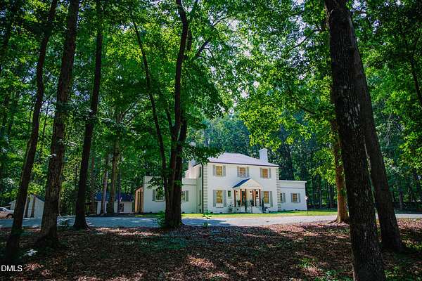 8.13 Acres of Land with Home for Sale in Hurdle Mills, North Carolina
