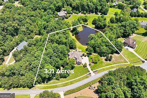 3.1 Acres of Land with Home for Sale in Cumming, Georgia